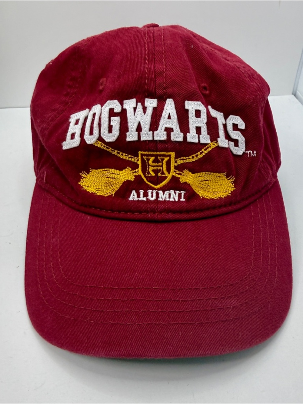 Harry Potter Adult Hogwarts Alumni Red Baseball Cap w Quidditch Brooms